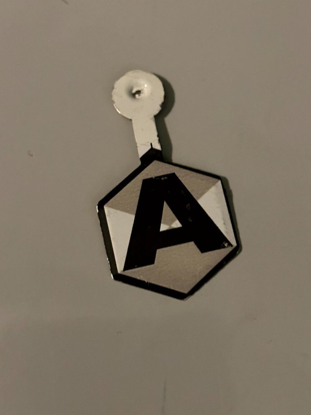Vintage Hexagon 'A' Pin Monogrammed Tin Litho Badge